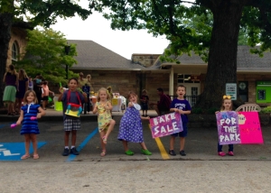 These kids helped their parents with a bake sale and lemonade stand fundraiser For the Parks.